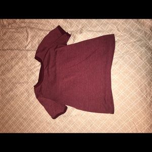 A plain maroon tee shirt
